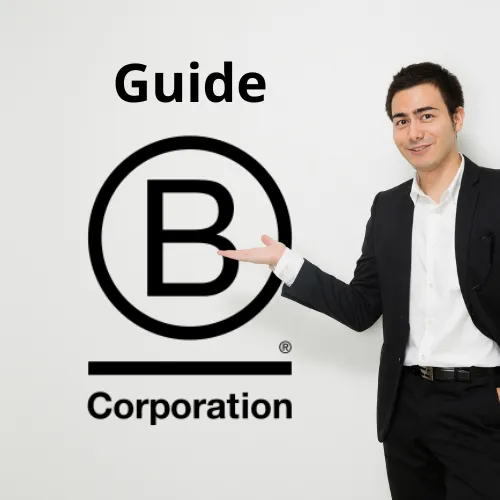 Homme en costume présentant le logo B Corporation avec la mention "Guide" pour la certification B Corp